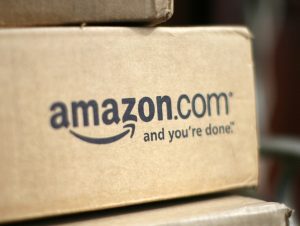 A box from Amazon.com is pictured on the porch of a house (Photo: REUTERS/Rick Wilking/Files)