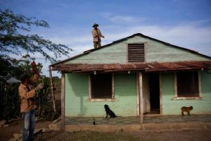 Residents of a village near Guantánamo, Cuba prepared their house for Hurricane Matthew. (PHOTO: ap.org)