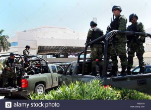 Mexican soldiers stand guard in Cancun in this file photo. PHOTO: EPA/ELIZABETH RUIZ